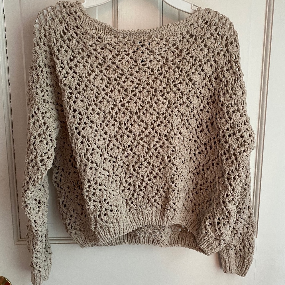 Tan sweater with holes